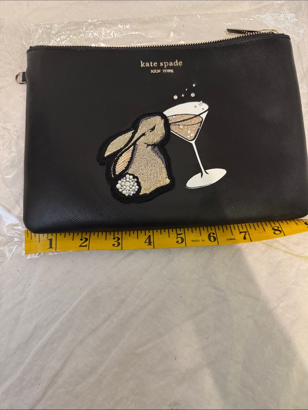 kate spade black bunny & cocktail wristlet pouch